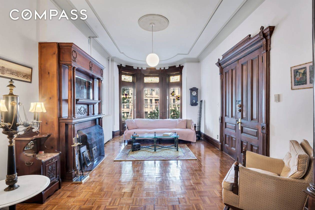 Half a house ! This gorgeous brownstone duplex sprawls over approx.