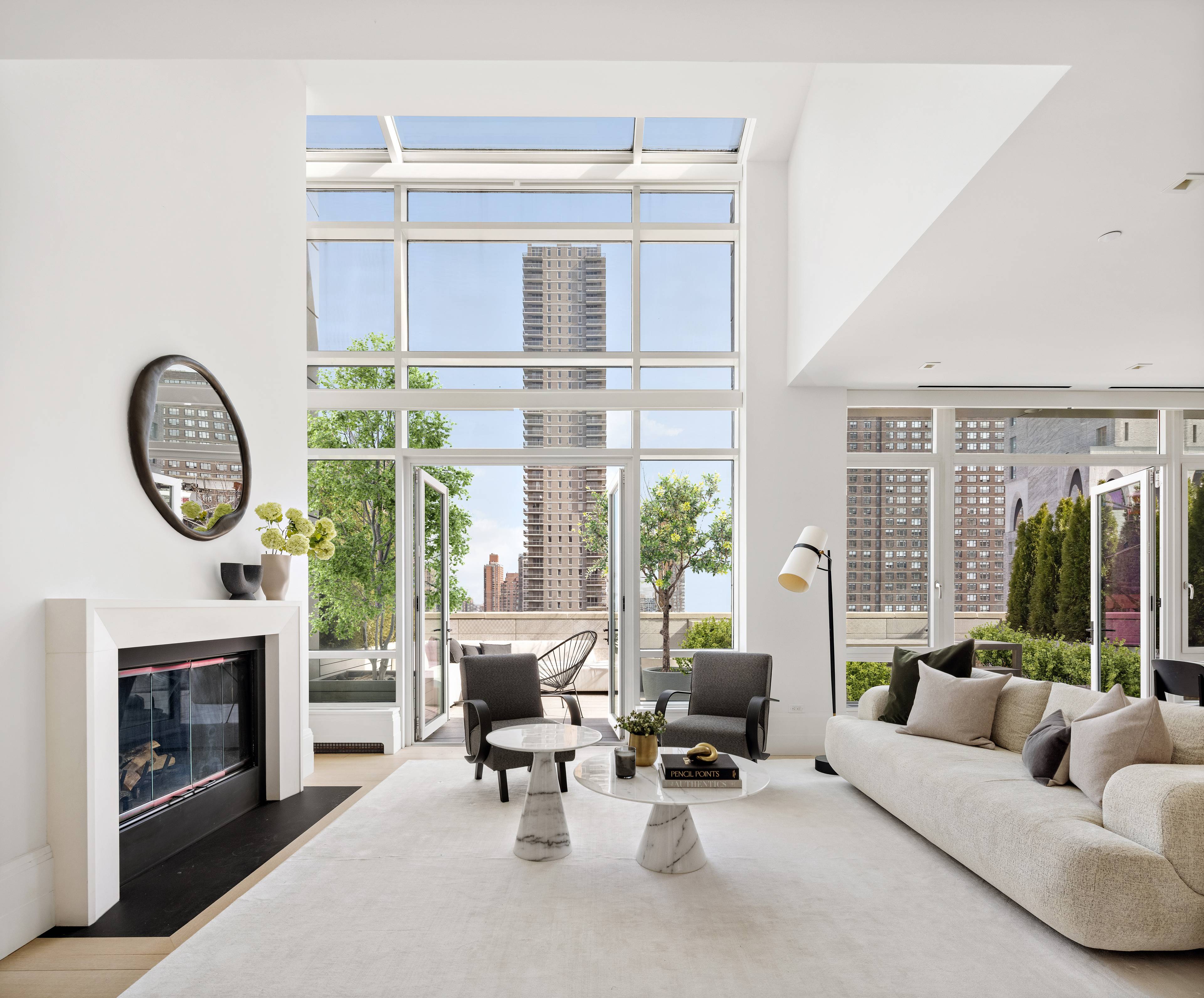 Every room of this bright, breathtaking penthouse leads out onto the four private, usable terraces with open views.