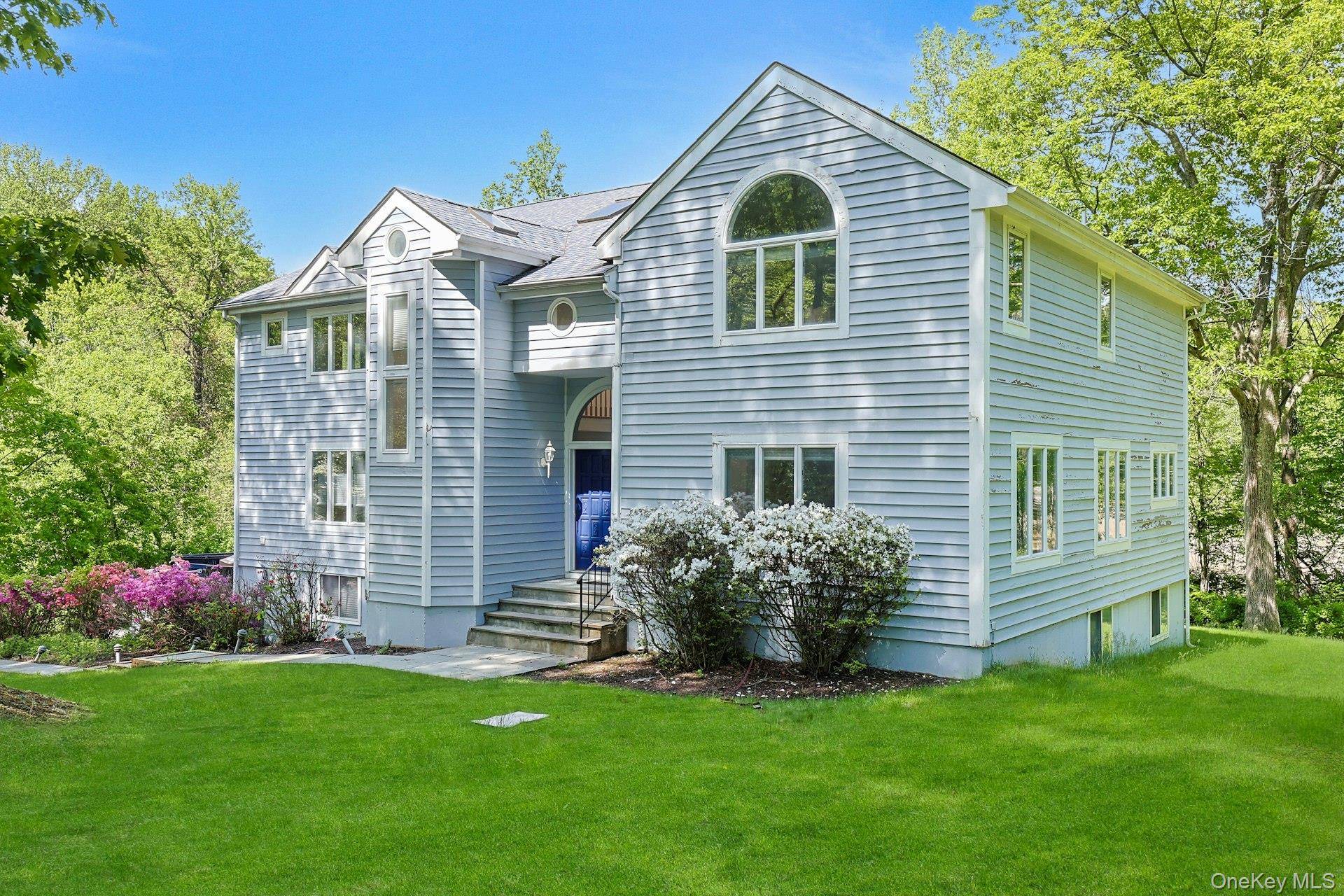 Welcome to 14 Cross Road, an elegant Colonial residence set on 2.