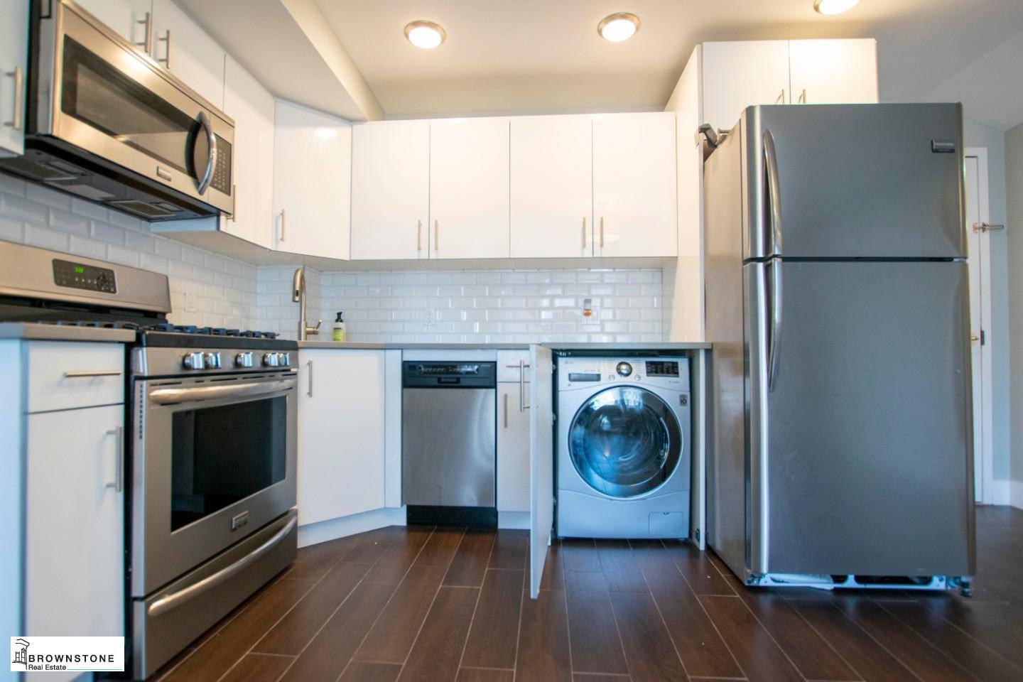Tucked away on quiet Bond Street, this ALL NEW spacious one bedroom apartment features an eat in kitchen, microwave, dishwasher, washer amp ; dryer, and central a c.
