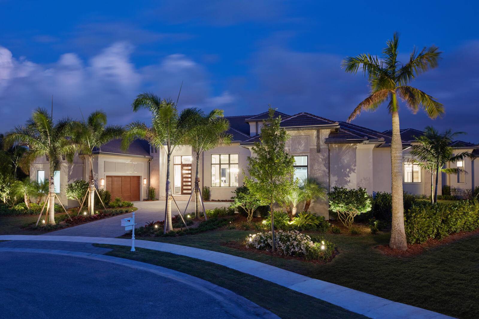 This new construction estate by Stock Custom Homes is located in the private, gated golf community of Palm Beach Polo and boasts a waterfront, 0.