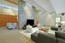 Thoughtfully designed skylights make an unusual architectural design within the open space creating visual interest.