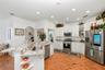 Spacious renovated kitchen with new appliances, granite