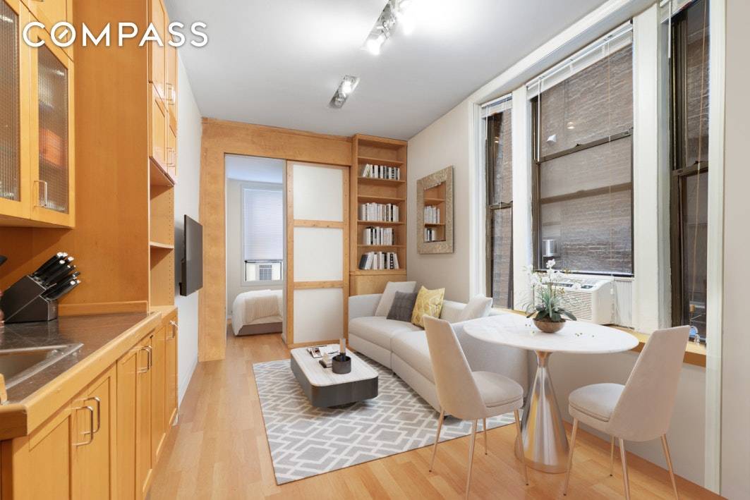Pictures are Virtually Staged Charming one bedroom in the heart of Murray Hill Kips Bay with renovated Miele kitchen and marble bathroom.