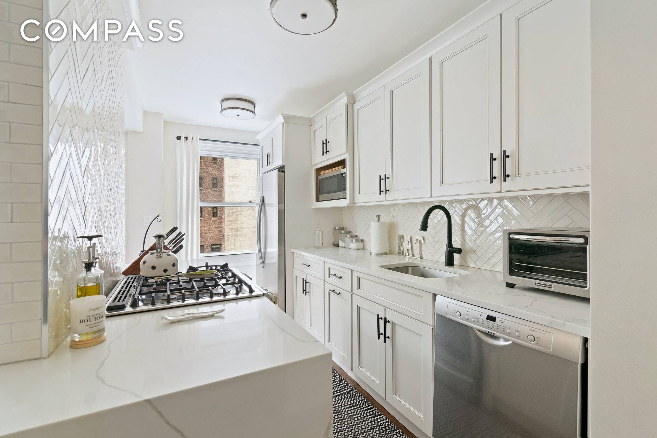 Gorgeous, large fully renovated one bedroom, one bath apartment with home office nursery in the Prewar Jewel of the Hudson Yards Manhattan West area.