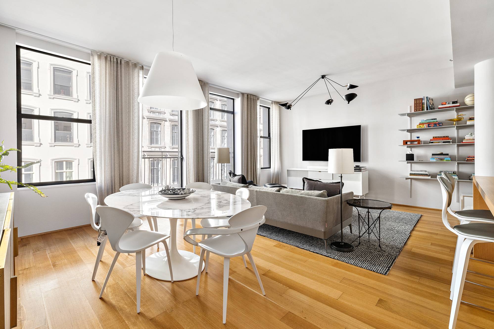 An elegant Tribeca condo graced with refined custom finishes, this 3 bedroom, 3.