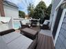 Back deck overlooking your backyard oasis