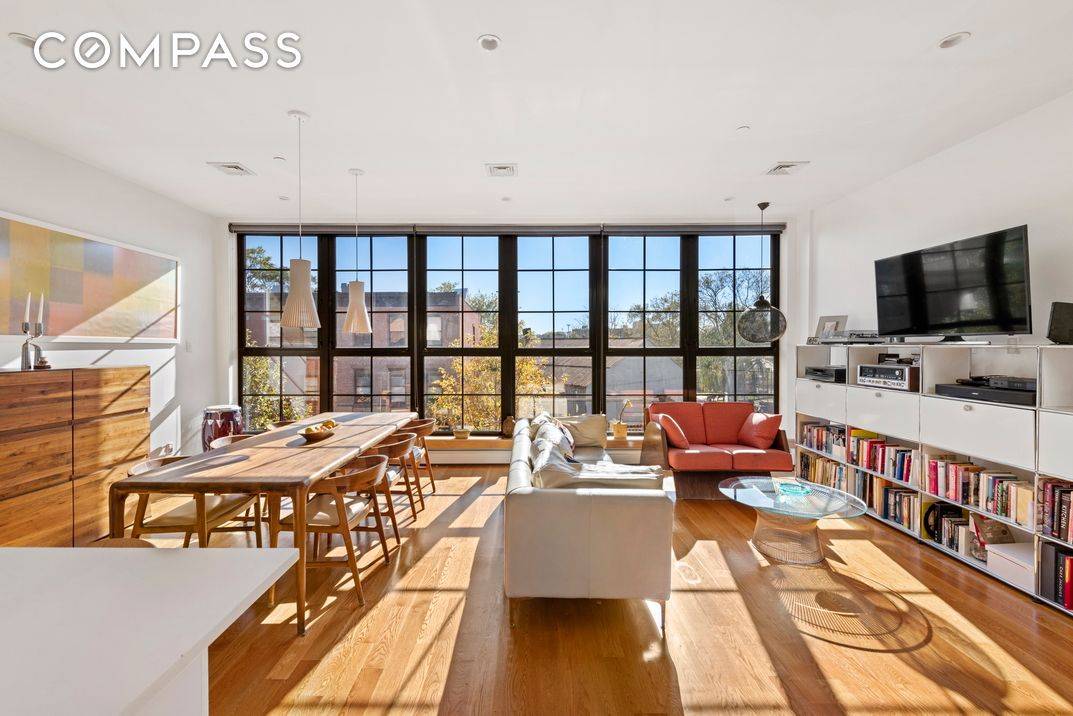 A sublime duplex condo saturated with natural light, this loft like 4 bedroom, 3 bathroom home is a true exemplar of contemporary Brooklyn luxury.