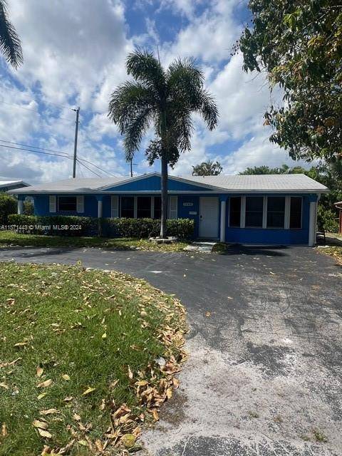 This renovated 4BD 3BA dream home in the desirable Coral Ridge Isles neighborhood is sure to impress.