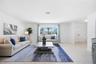 large picture window in living room brings in lots of natural light