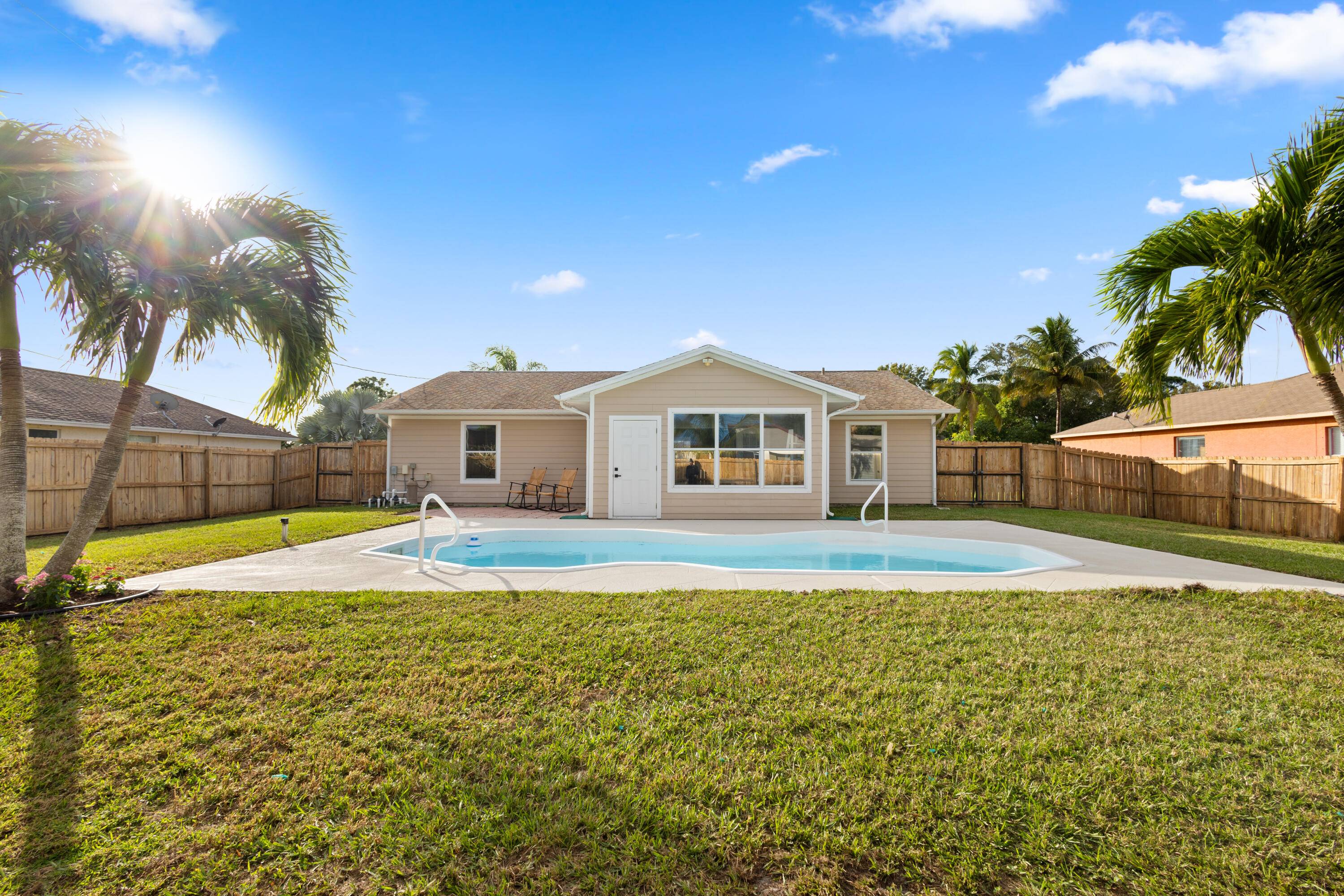 This beautiful renovated pool home has a price improvement.