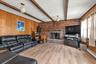 Family room with wood burning fireplace. Great option for formal dining room.
