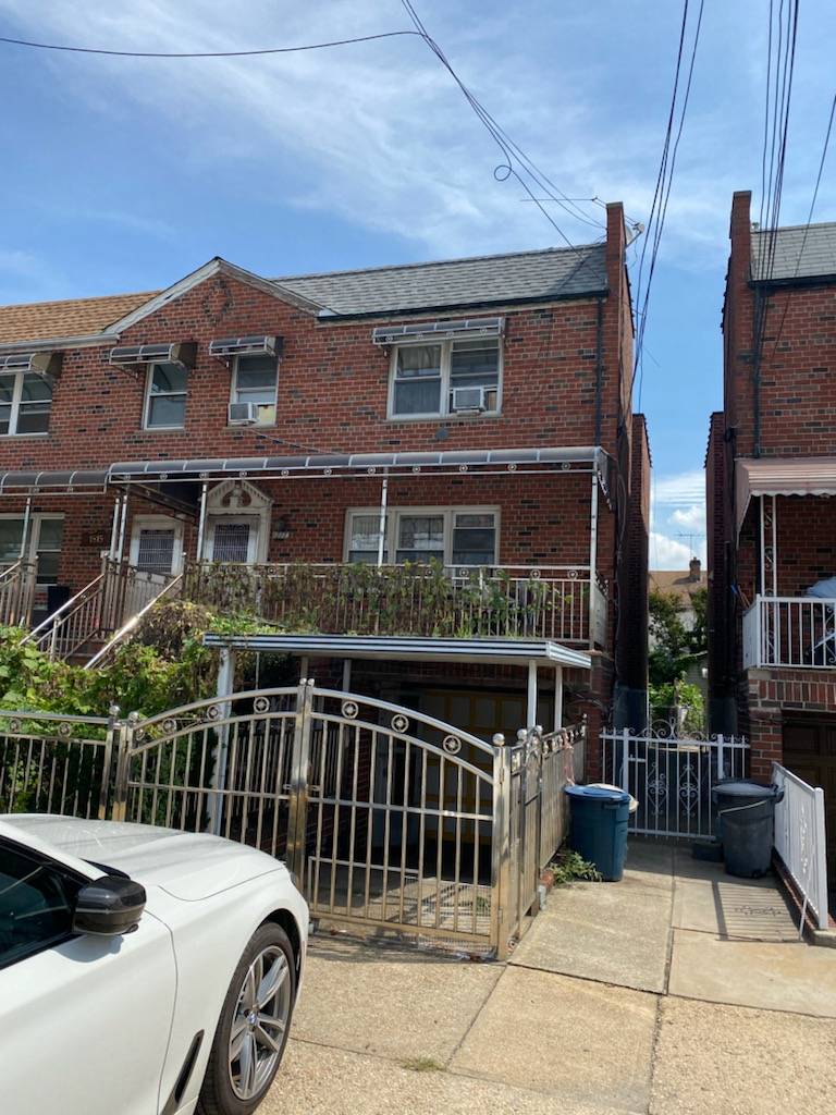 Prime Bensonhurst Stillwell Semi attached BRICK 3 over 2 over 2 bedrooms with large living room, formal dining room !