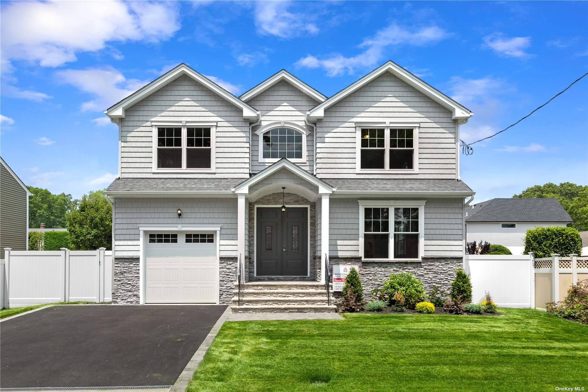 Nestled in the heart of Massapequa this magnificent new build awaits you.