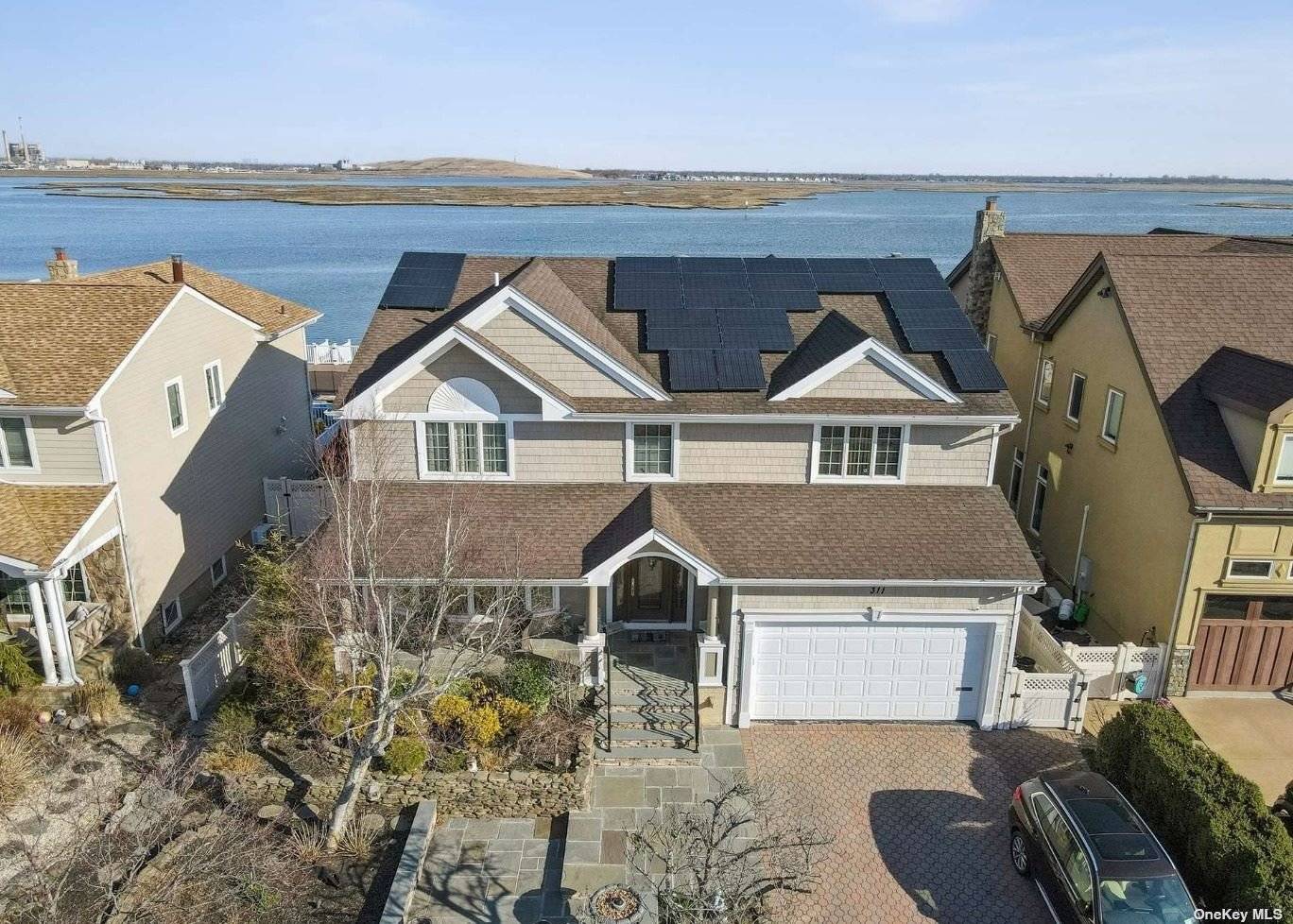 Beautiful Bayfront Home Offered For YEARLY Rental Bay Front Living Truly At It's Finest in Lido West !