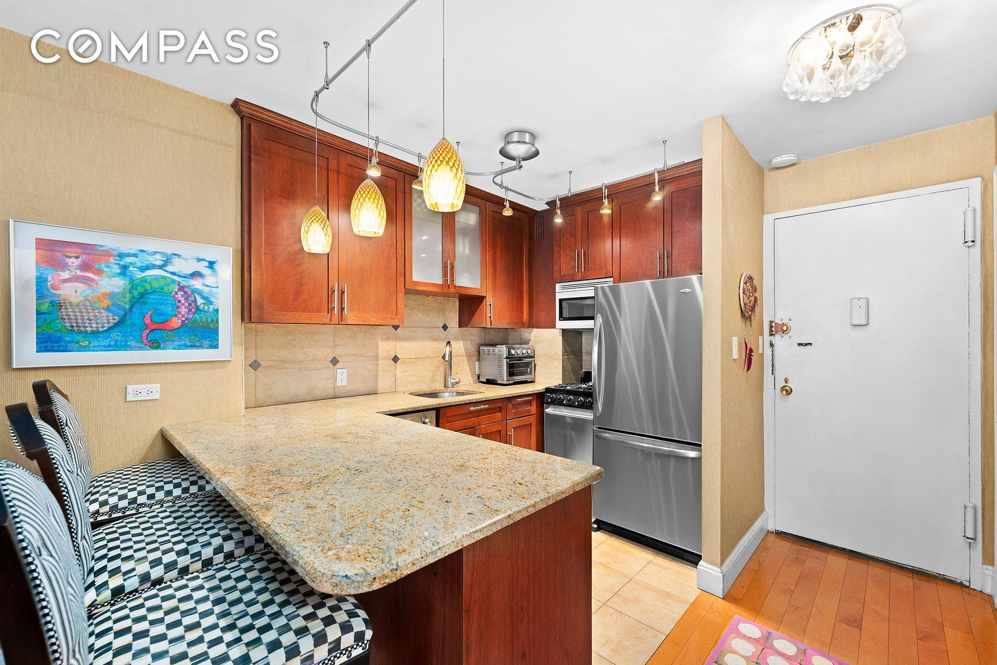 GREAT NEW PRICE ! Enjoy city and Chrysler Building views from this stunning, large, sun filled, south facing beautifully renovated alcove studio.