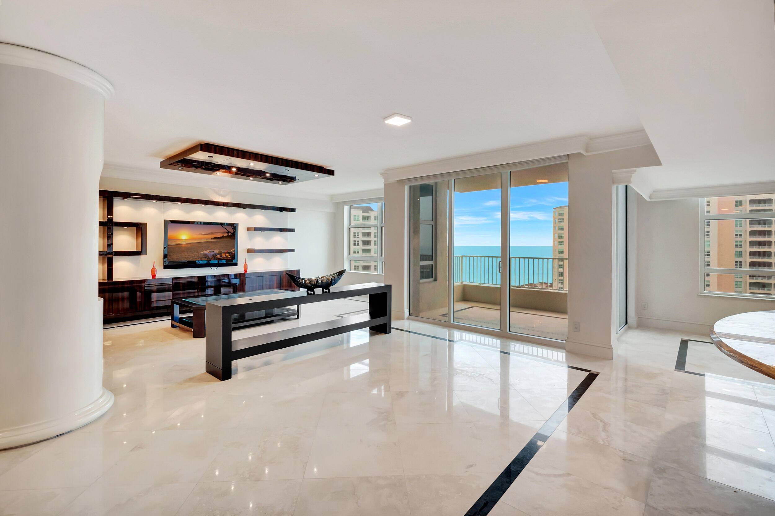 Indulge in the ultimate South Florida lifestyle with this 14th floor exquisite 4 bedroom 4.