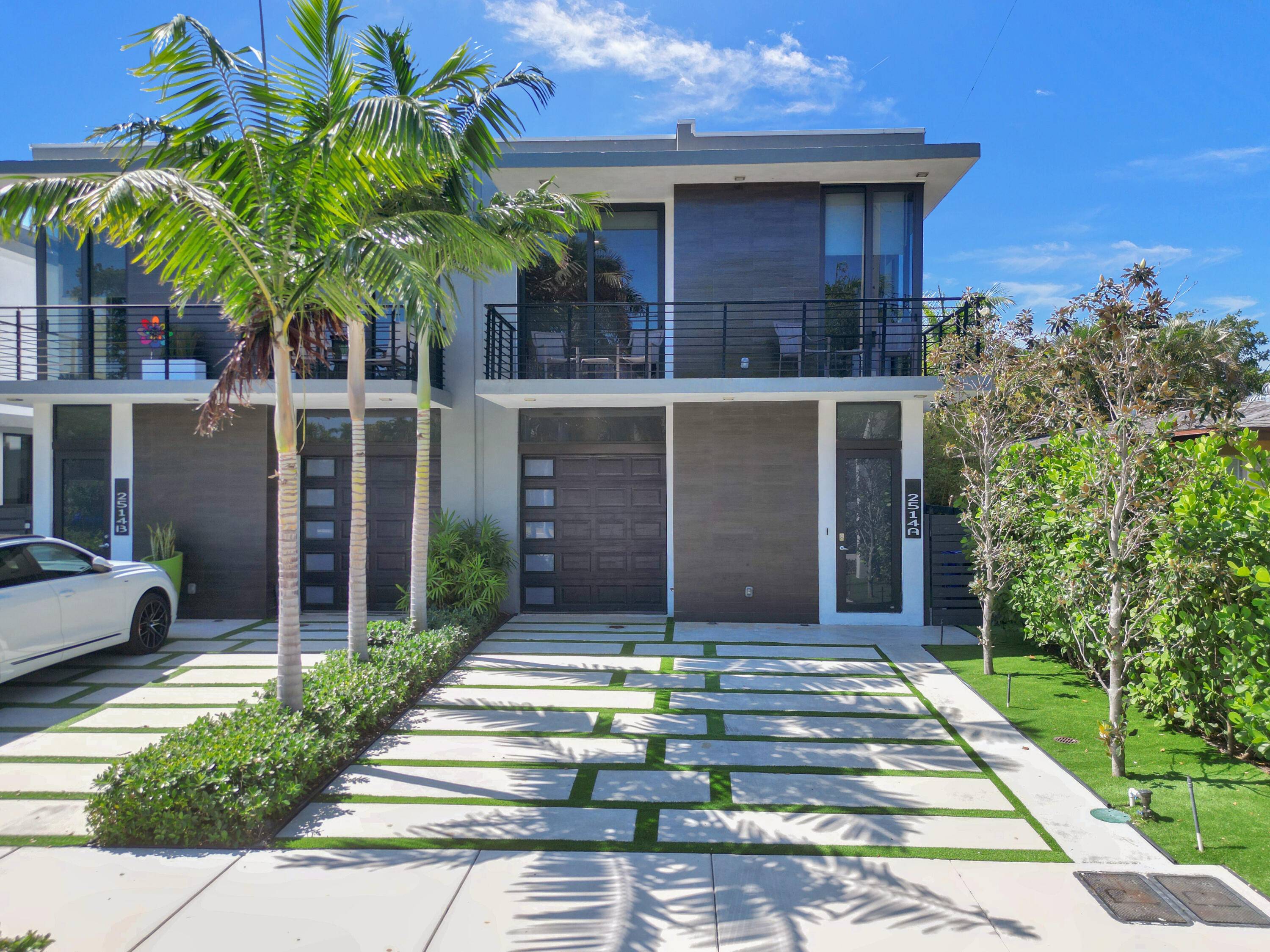 Experience the epitome of luxury in this modern, two story residence, featuring three bedrooms and three and one half bathrooms all en suite with private balconies plus a den.
