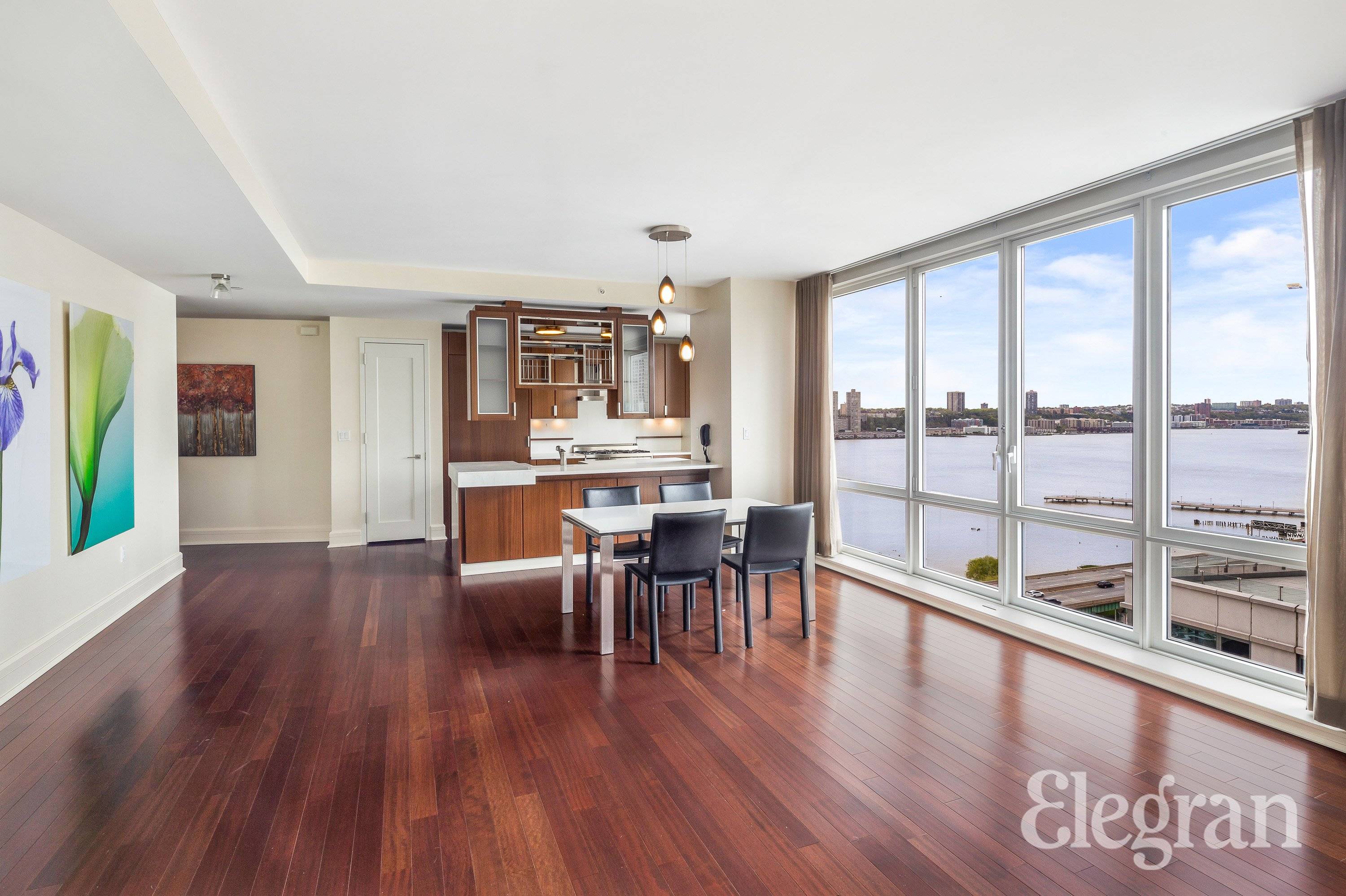 Spacious and pristine corner two bedroom condo with sweeping river views is now available at The Aldyn in Lincoln Square.