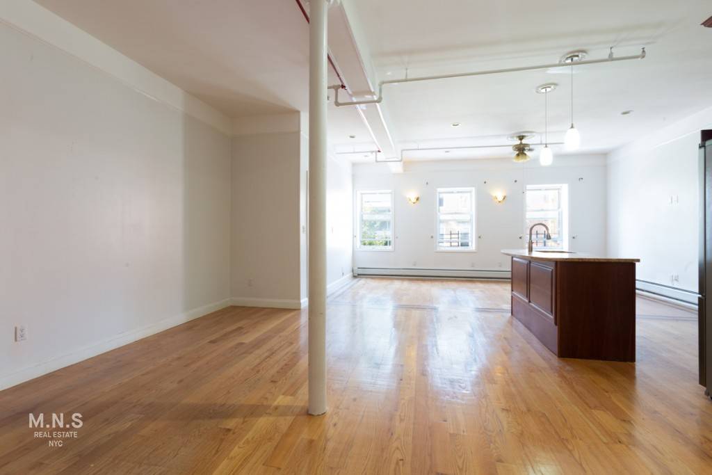 Step into your spacious, open, sunlit loft style apartment with expansive ceilings and light oak hardwood flooring throughout.
