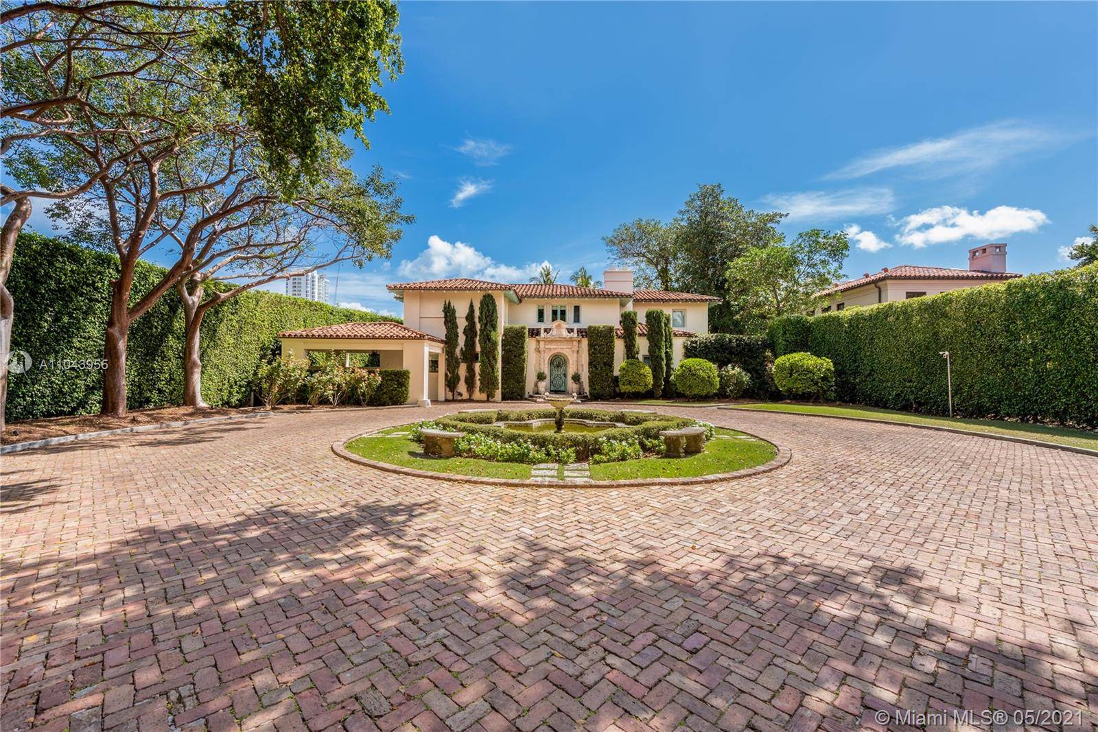 Magnificent Mediterranean waterfront estate on Flamingo Drive with grand architecture by famous architect, Carlos Schoeppl !