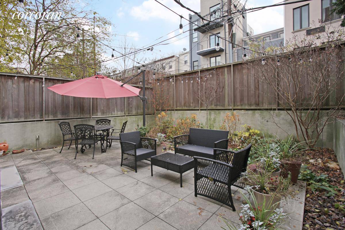 Park Slope duplex apartment that features 2 bedroom recreational space, 2 bath and a shared garden.