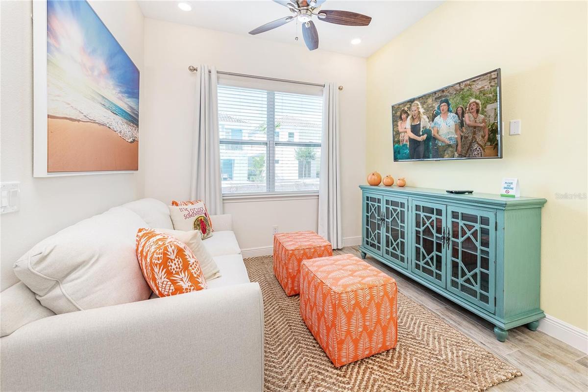 Bright living room with natural light and coastal finishes in Margaritaville Resort Orlando
