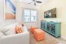 Bright living room with natural light and coastal finishes in Margaritaville Resort Orlando