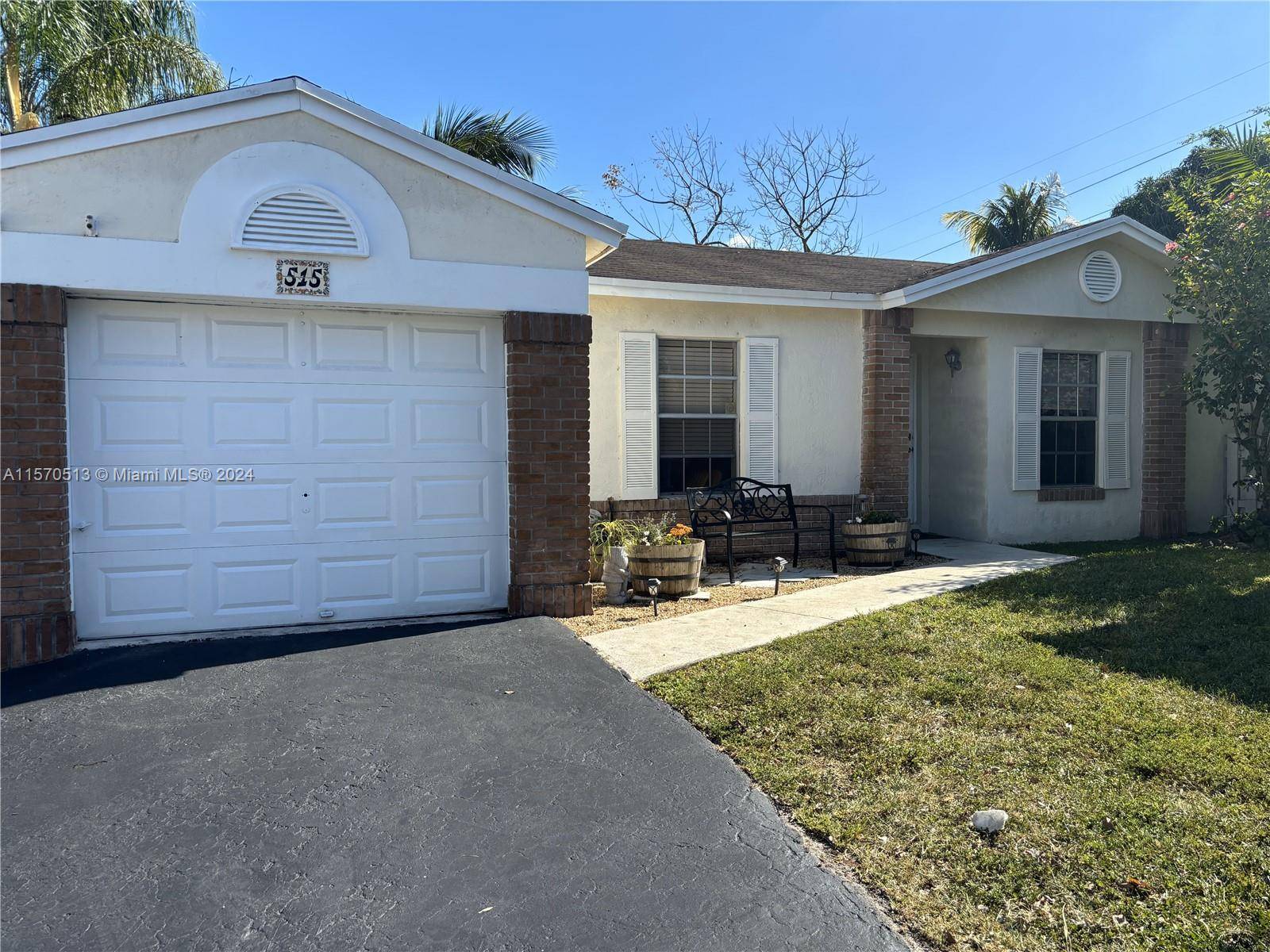 This charming home in Shenandoah of West Davie has 3 bedrooms and 2 bathrooms plus an extra bedroom with a closet.