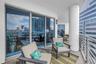Enjoy the Outdoor Views and Sounds of the Vibrant City from 12 Floors Up. COOL!