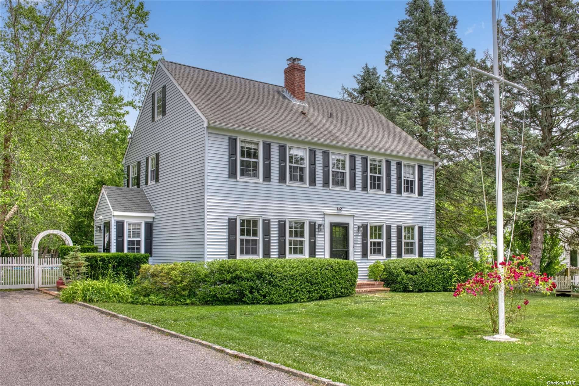Stylish 4 bed 2. 5 bath colonial with heated saltwater in ground pool in the heart of Southold.