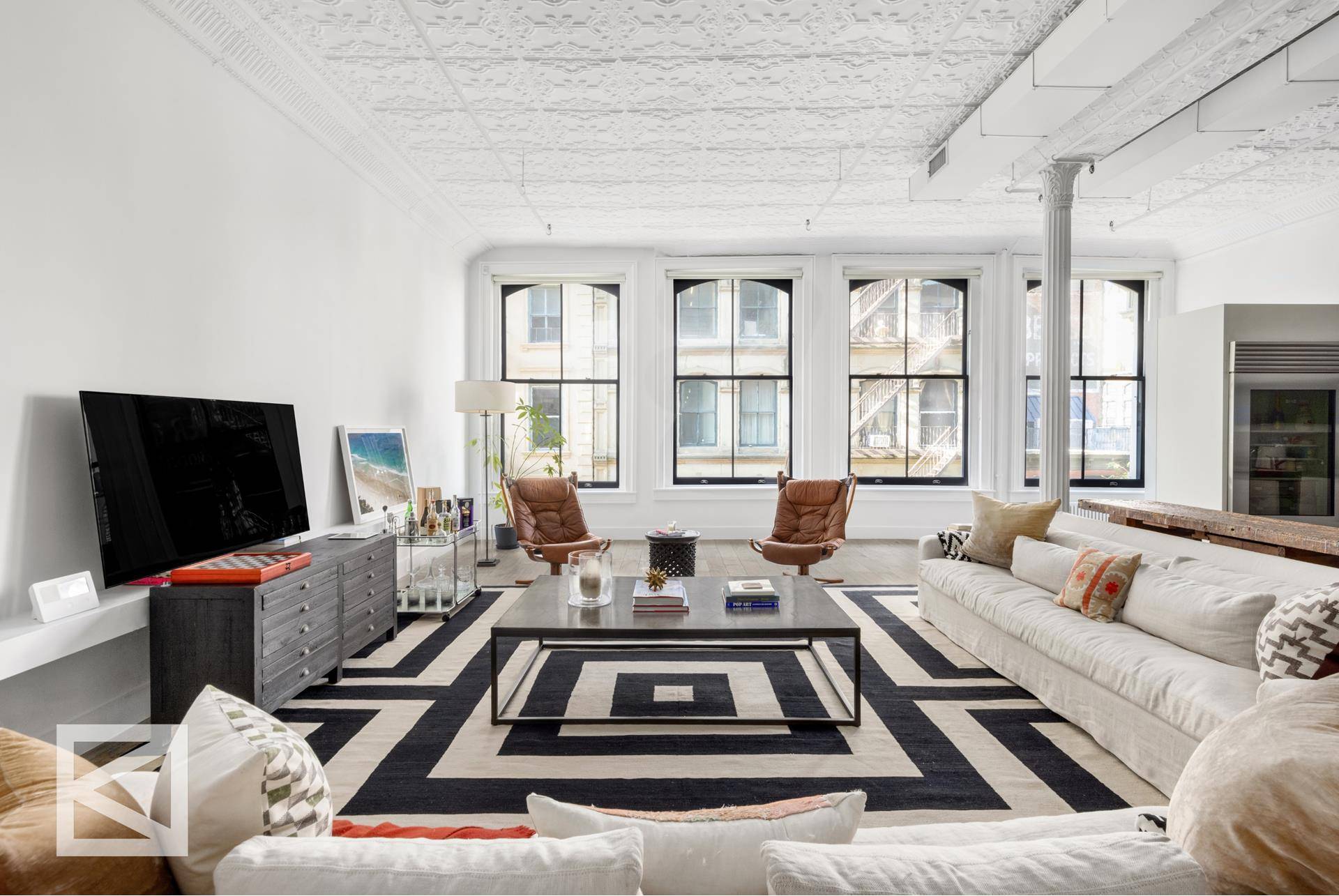Nestled on one of the most desirable streets in Tribeca, this 5 story, cast iron beauty sits apart.