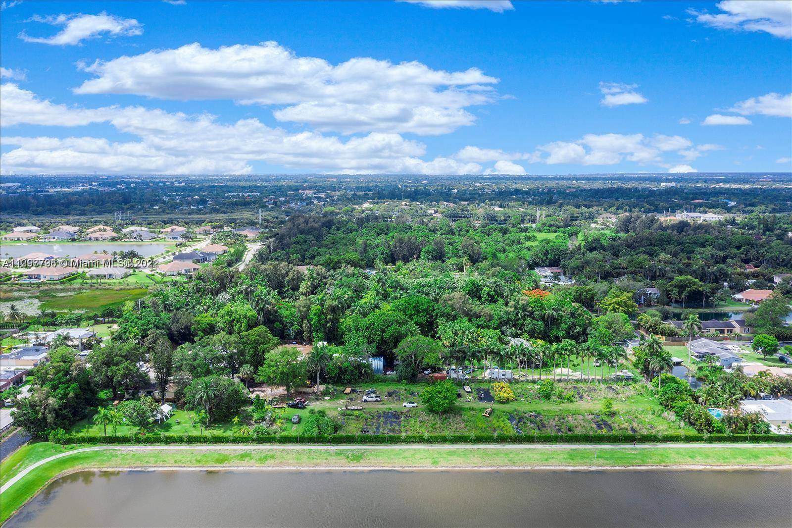 HUGE 2. 4 acre lot centrally located in Davie !