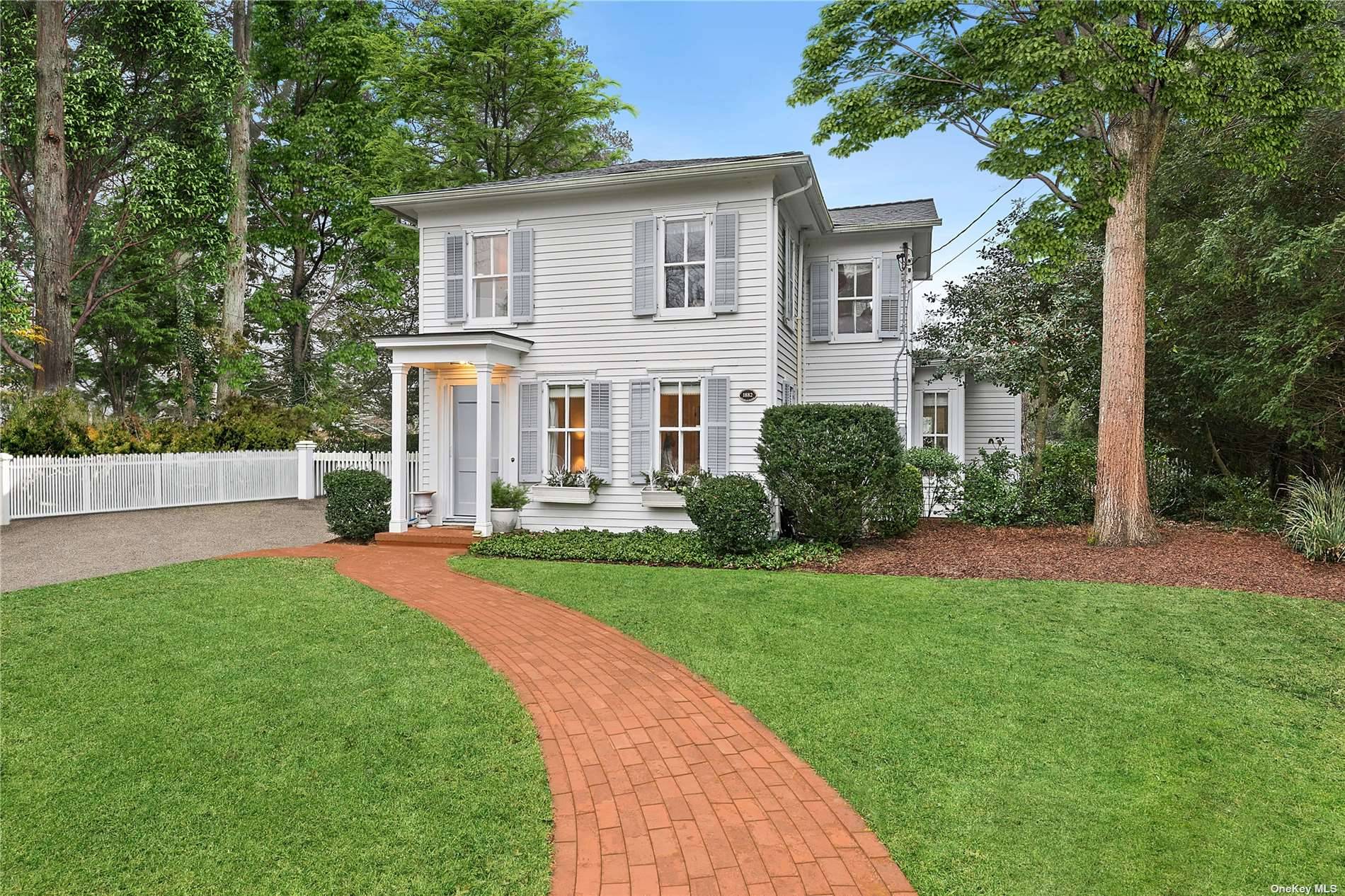 Step into casual charm at 178 South Country Road, nestled in the heart of Bellport's coveted historic village.