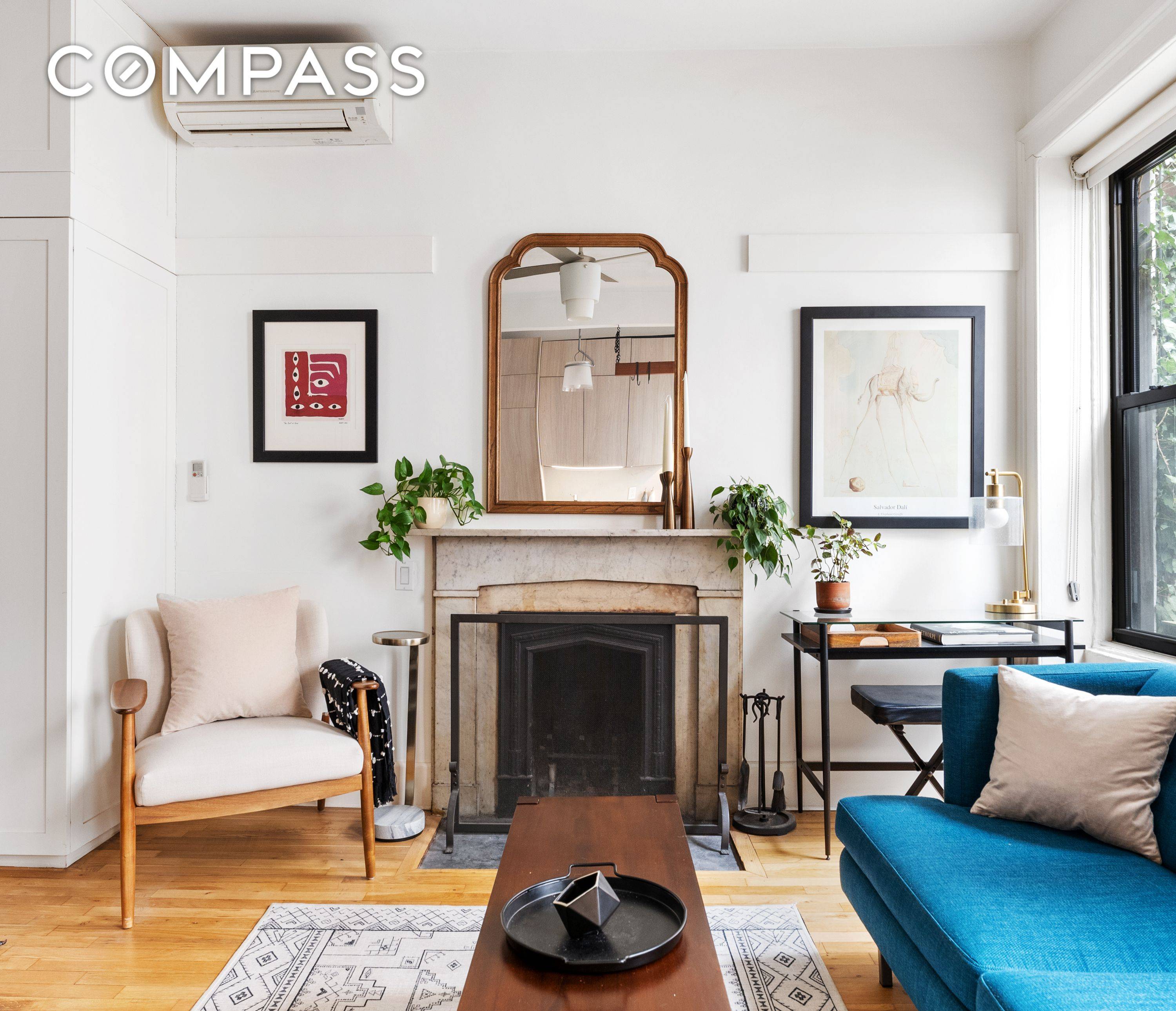Clean, modern lines are gracefully unified with prewar details in this spacious, turnkey, full floor 2 bedroom Chelsea home with a wood burning fireplace !