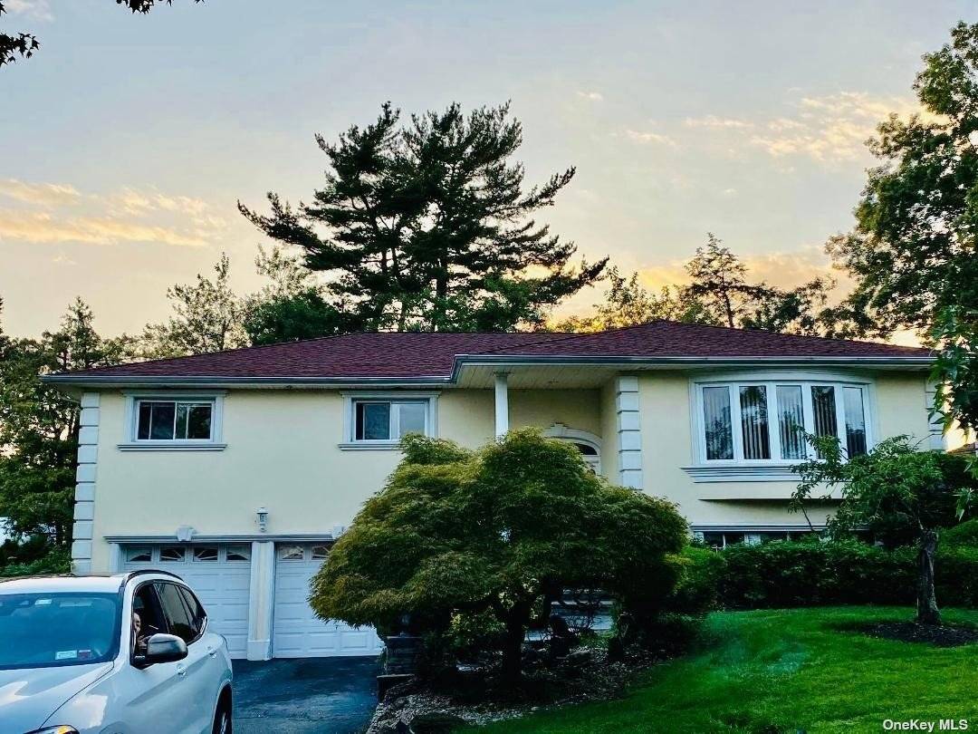 Don't miss the opportunity to see this beautiful high ranch style home, located in the highly sought after residential neighborhood of Manhasset Hills and Great Neck South school district.