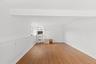 Grand open, bright and spacious living room with new luxury vinyl flooring and freshly painted.