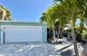 Welcome to your private waterfront retreat on the quiet end of the island