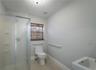 Full bathroom with shower.