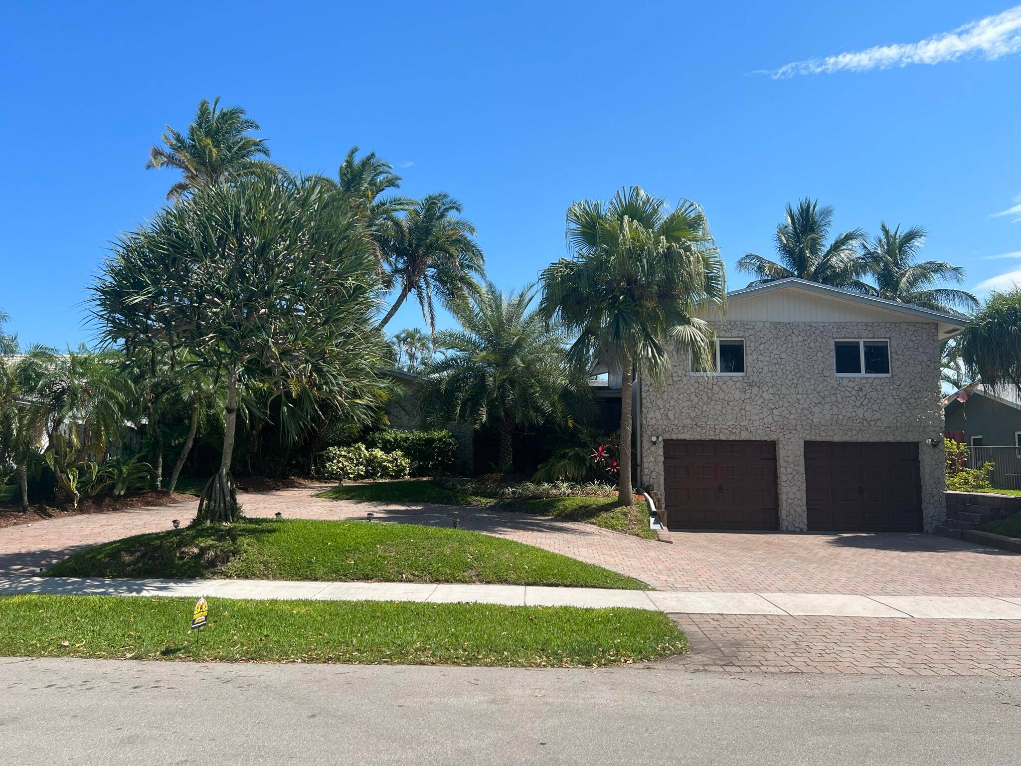 Enjoy hosting get togethers in this newly renovated Key West style 4 4 pool home in east Boca Raton.