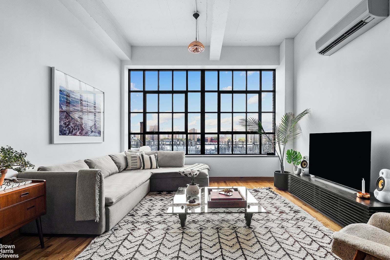 At the highly sought after KIRKMAN LOFTS condominium, the most perfectly charming loft awaits.