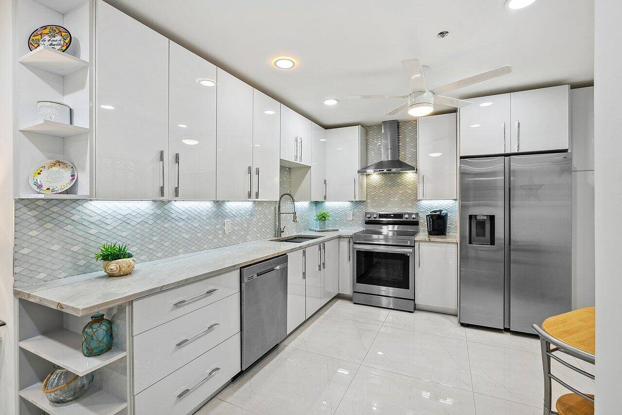 Experience unparalleled luxury in this exquisite 3 bed, 2 bath condo, fully remodeled for 2023 living.