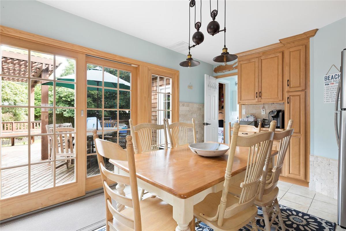 Dining room featuring light tile patterned floors