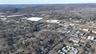 Aerial view of property's location with a mountainous background