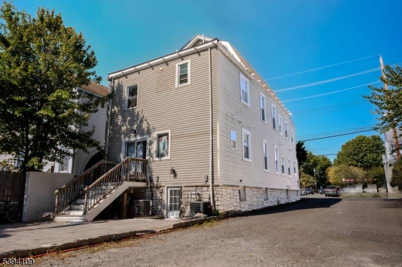 Fully renovated two family in Bloomfield on an exceptionally deep 63' x 258' lot with an in ground pool ?