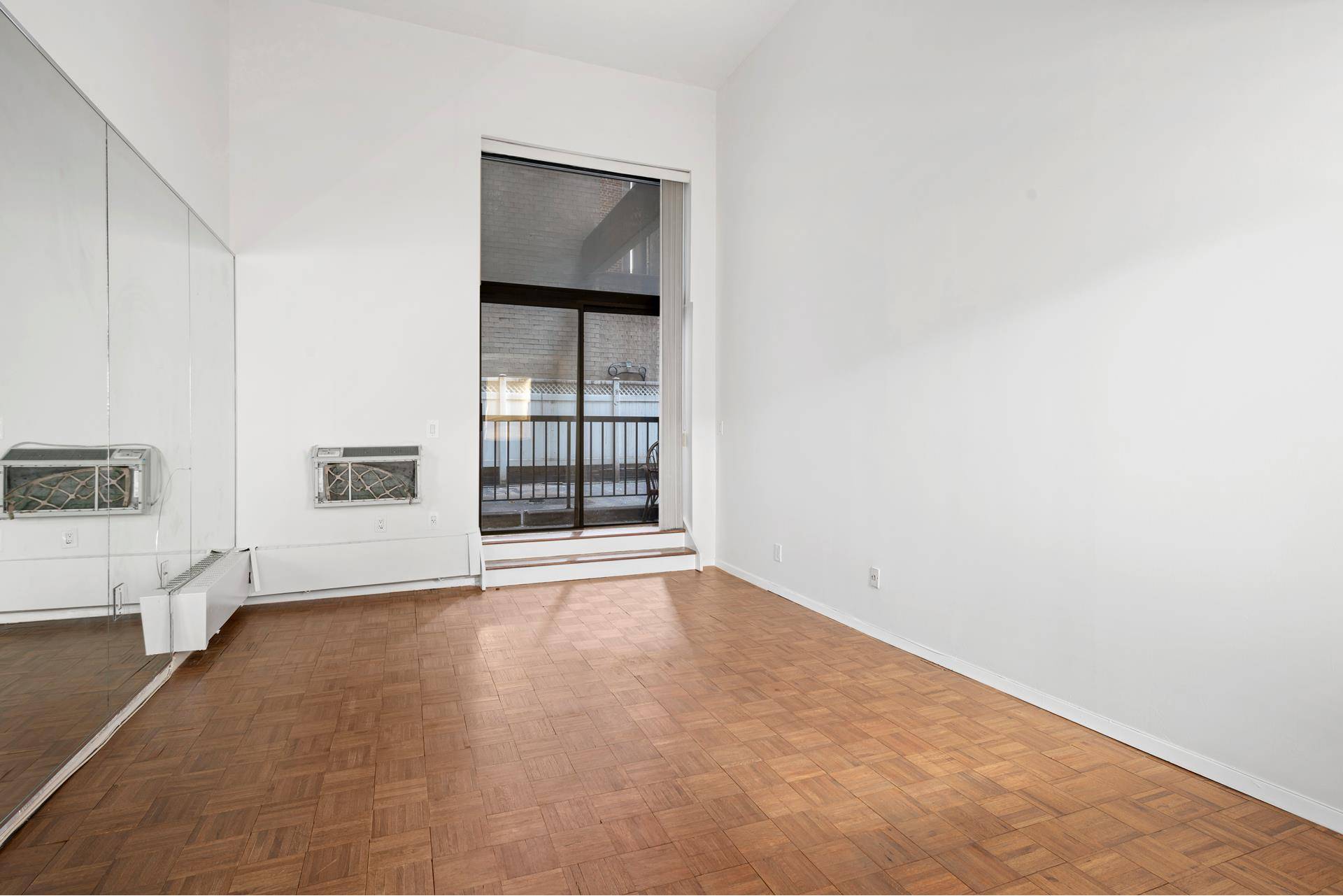 Spectacular over sized open layout versatile lofted studio with soaring 14 foot high ceilings.