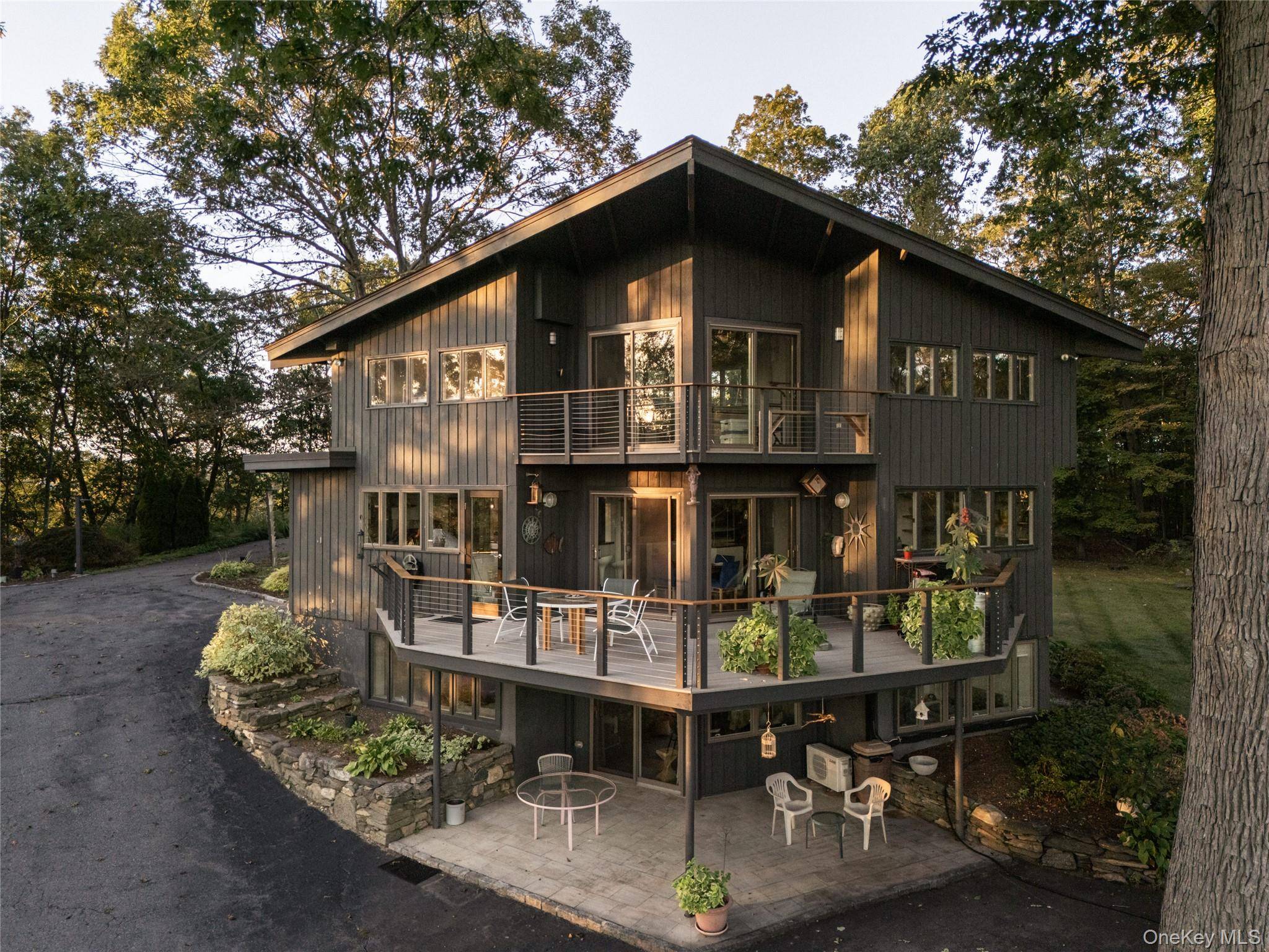 Single family home with a detached garage amp ; studio with a half bath, prep sink, and mini split heating cooling ideal for a home office, art studio, or potential ...