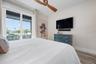 Bedroom 4 with ensuite bath and balcony