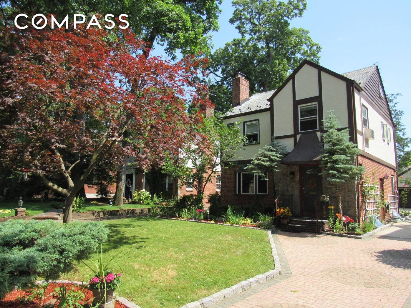 Lovely and lovingly cared for tudor home in leafy Jamaica Estates.