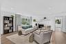 Family room, door on right side to Fabulous sunroom